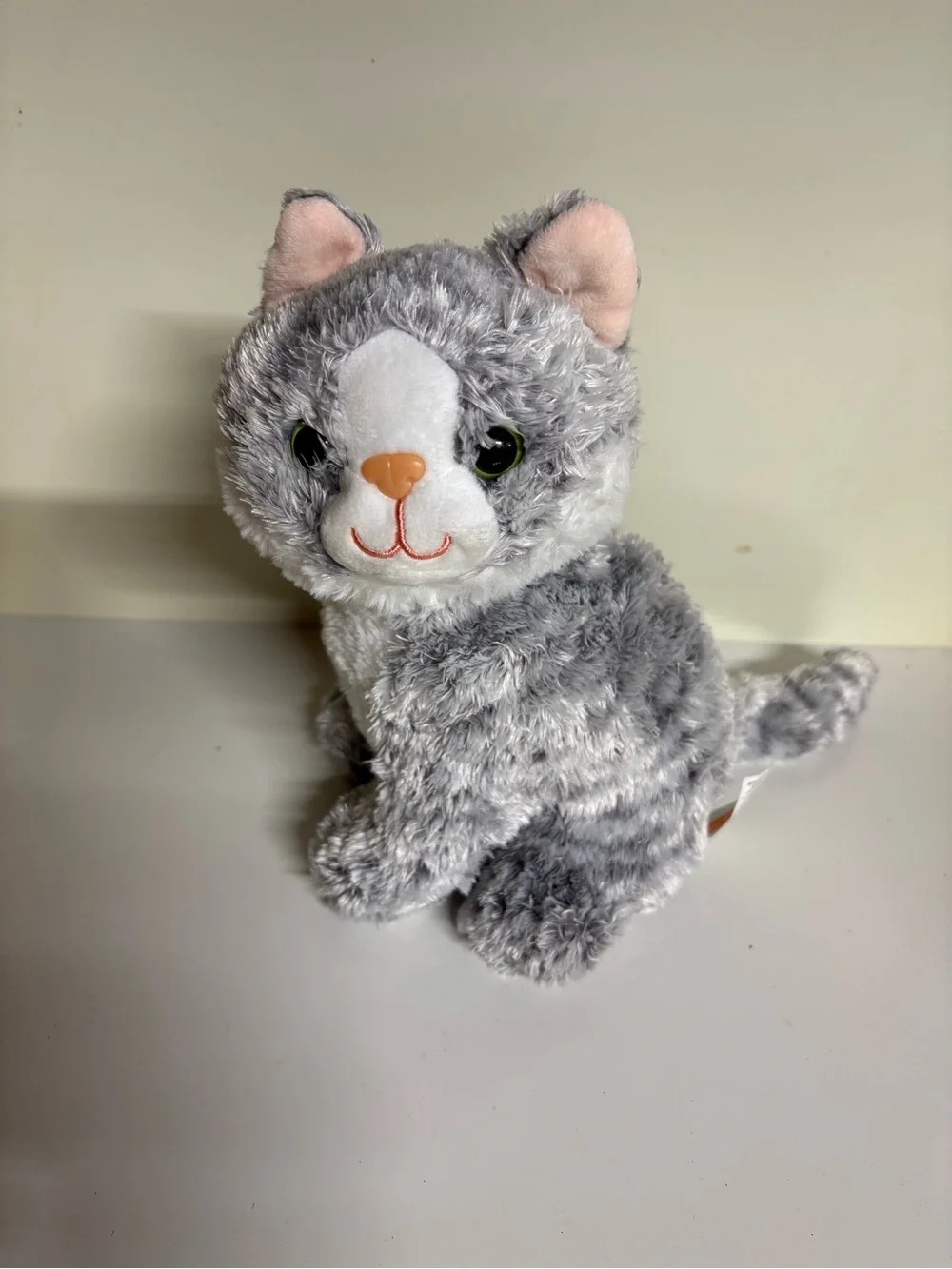 Melissa & Doug Greycie Tabby Cat, featuring soft grey and white patterned fur
